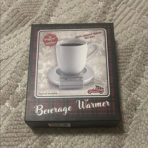 NWOT- Beverage Warmer. Christmas gift that was never used. Great for the office.